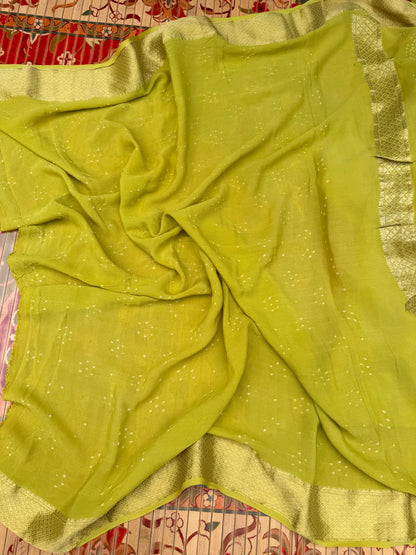 Pure benaras crepe with handknotted bandhini pallus & blouses.