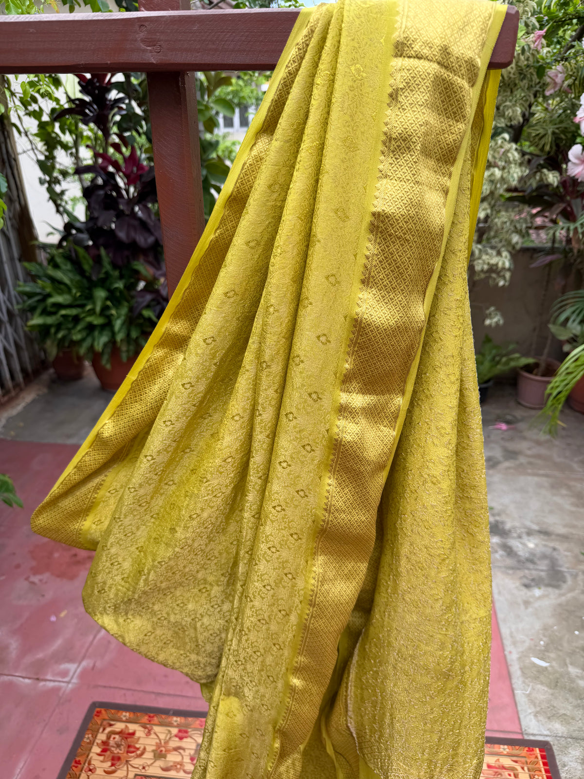 Pure benaras crepe with handknotted bandhini pallus & blouses.