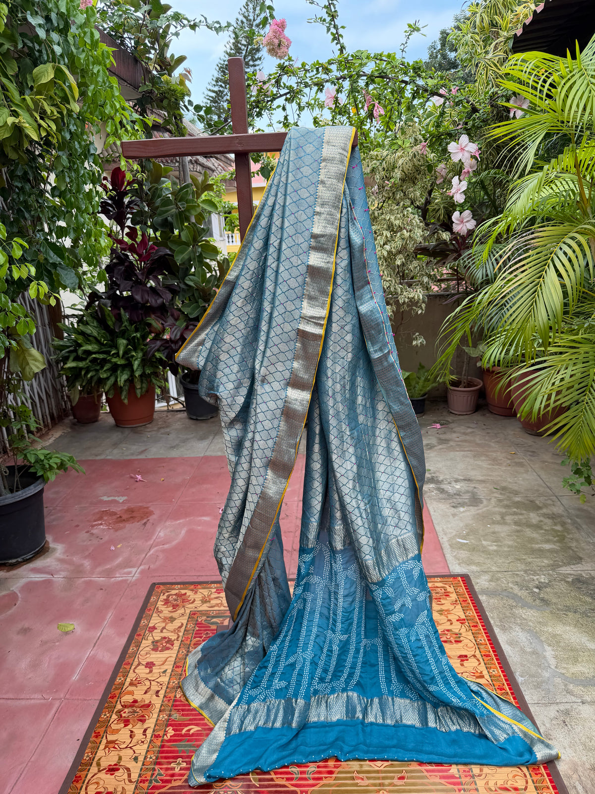 Pure benaras crepe with handknotted bandhini pallus & blouses.