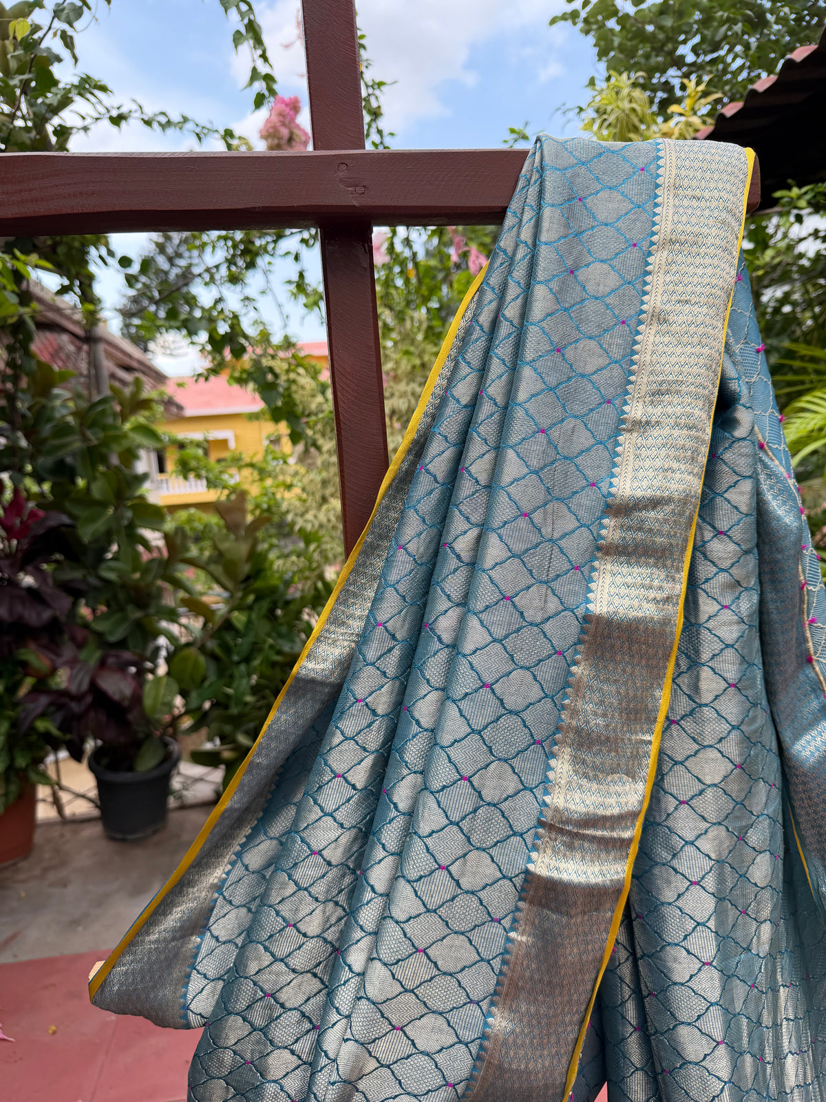 Pure benaras crepe with handknotted bandhini pallus & blouses.