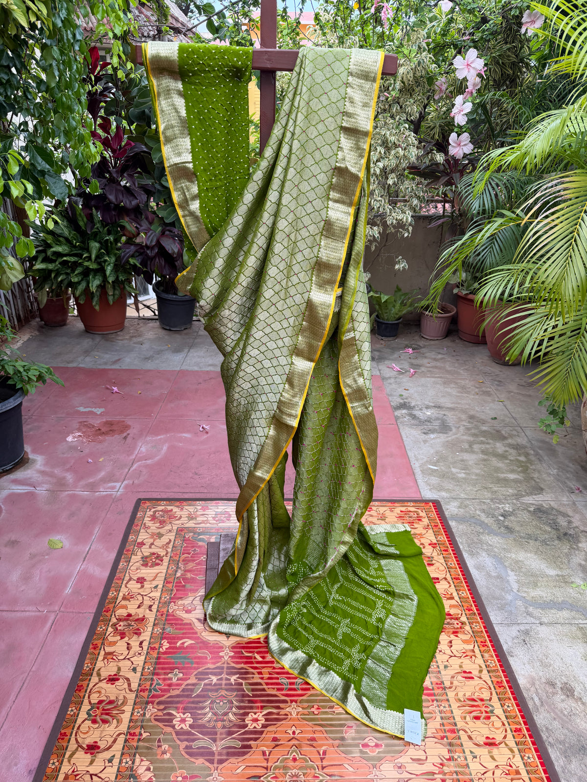 Pure benaras crepe with handknotted bandhini pallus & blouses.