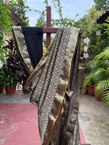 Pure benaras crepe with handknotted bandhini pallus & blouses.