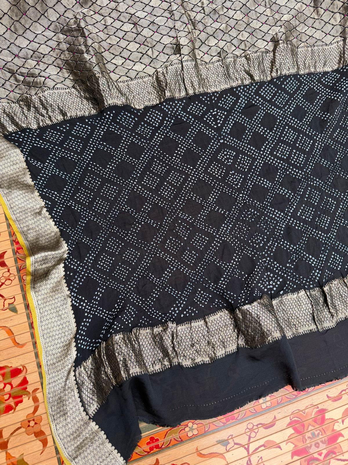 Pure benaras crepe with handknotted bandhini pallus & blouses.