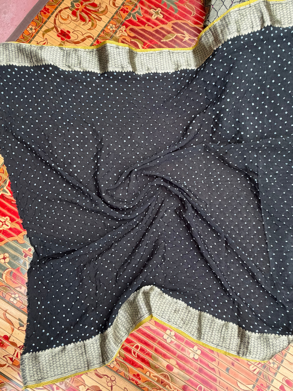 Pure benaras crepe with handknotted bandhini pallus & blouses.