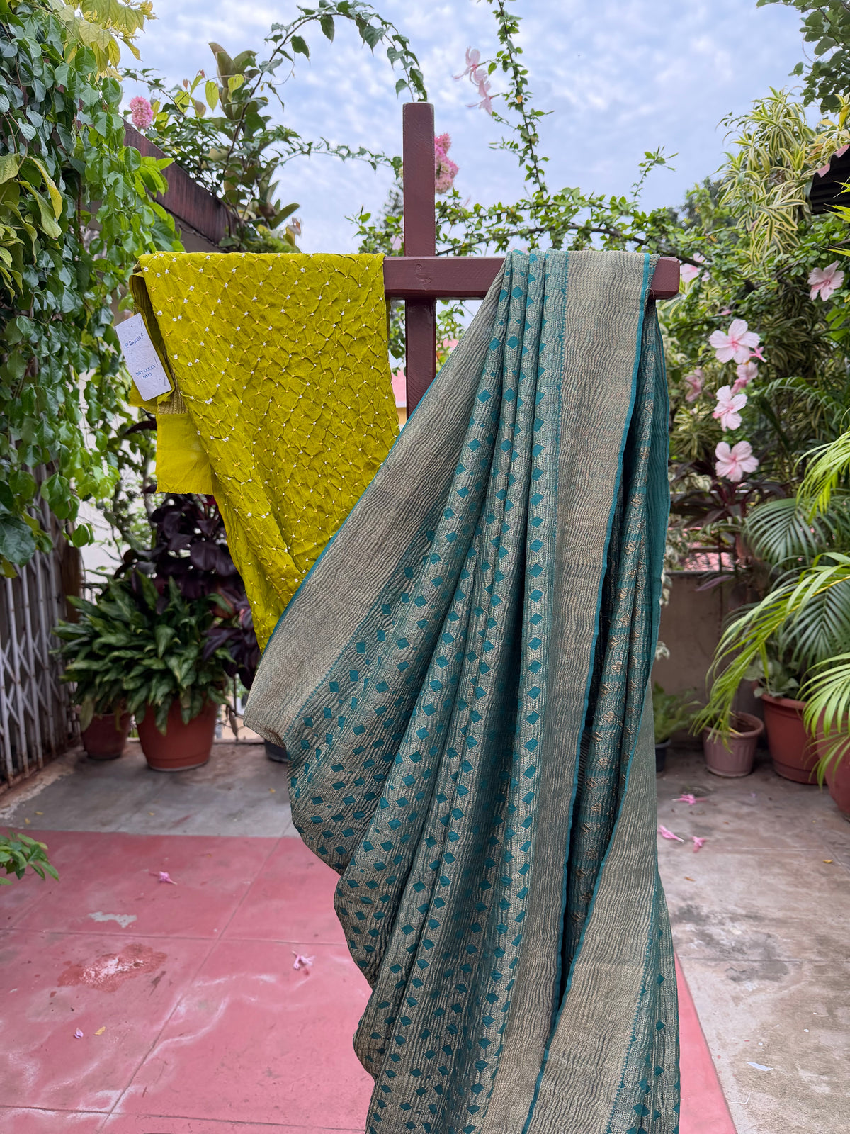 Pure benaras crepe with handknotted bandhini pallus & blouses.