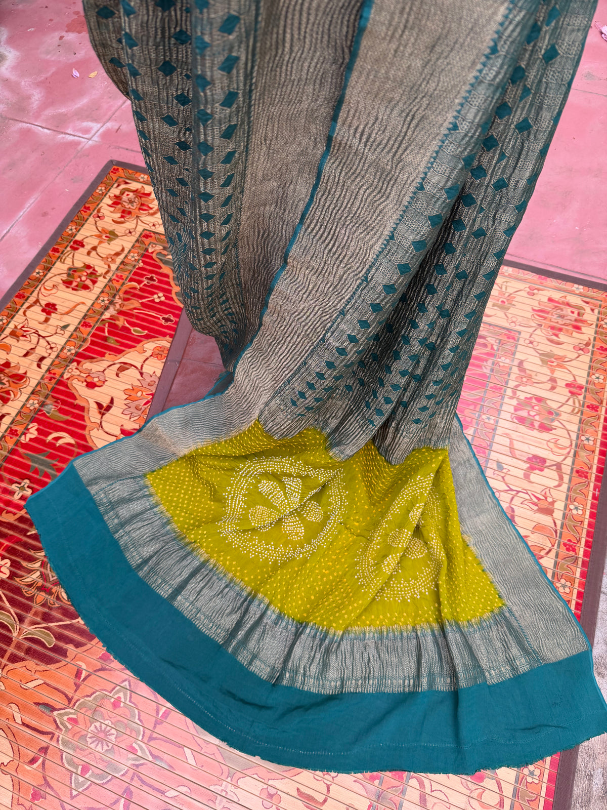 Pure benaras crepe with handknotted bandhini pallus & blouses.