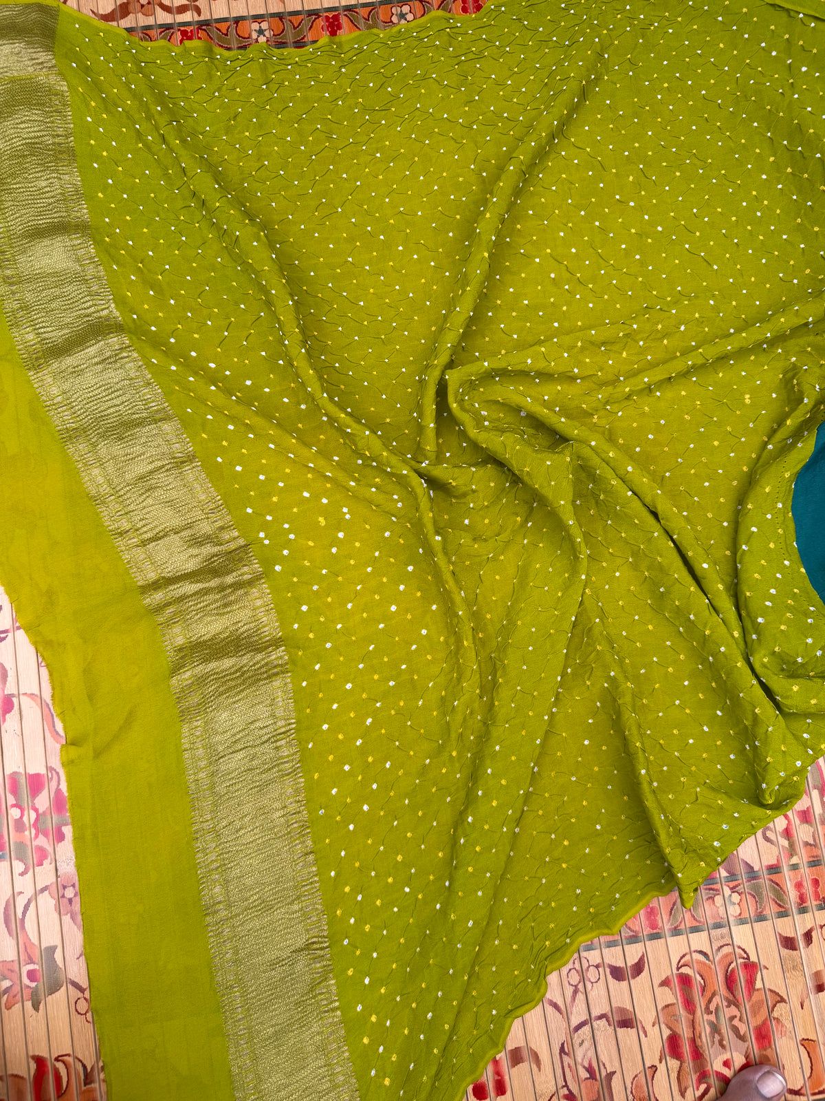Pure benaras crepe with handknotted bandhini pallus & blouses.